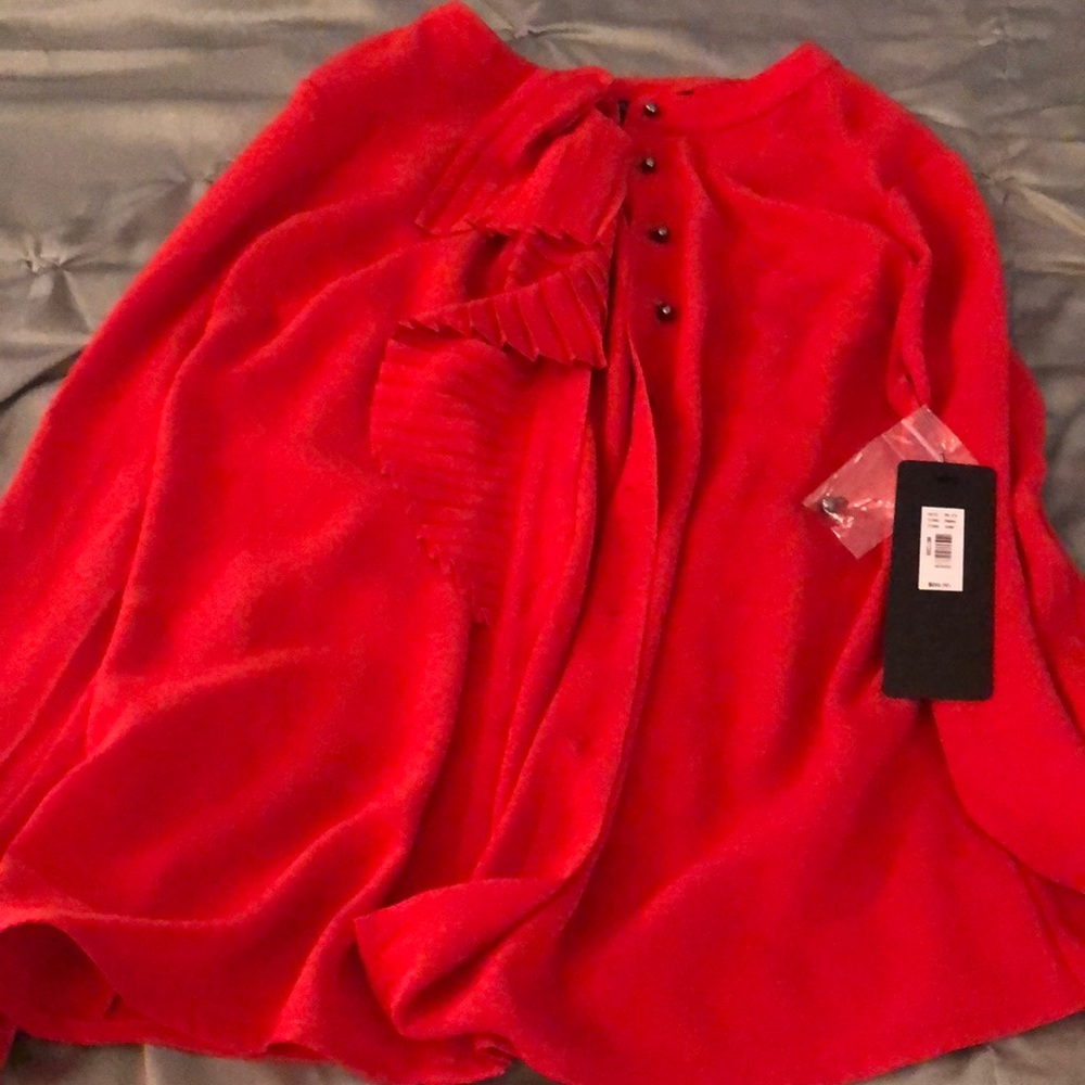 Red bell sleeve blouse